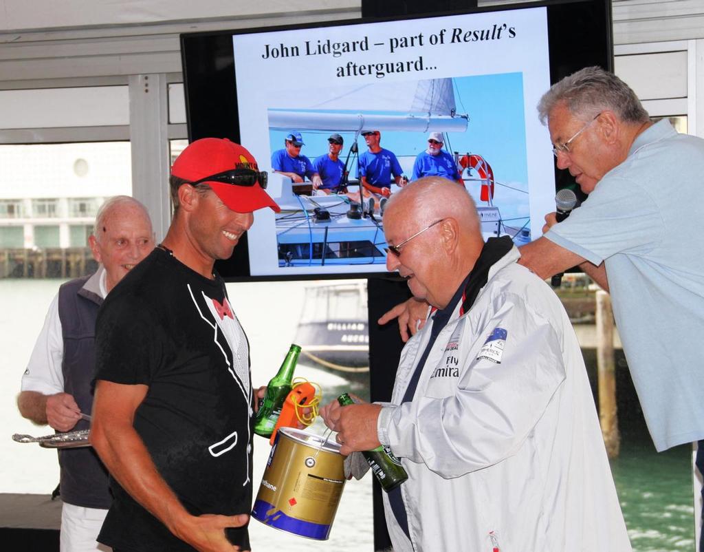 Result owner/skipper Bevan Hill receives the 'Prix D’Elegance' award from Altex Coatings’ NZ manager Ron Brown © Alan Sefton
